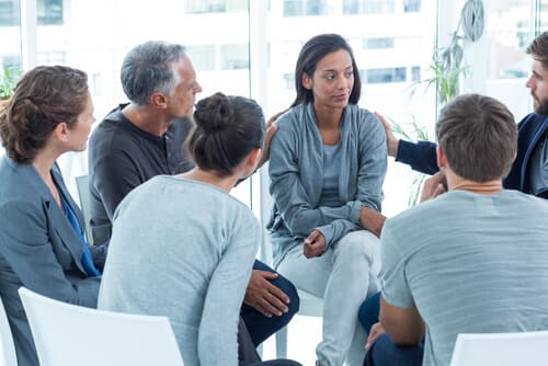 woman in group therapy