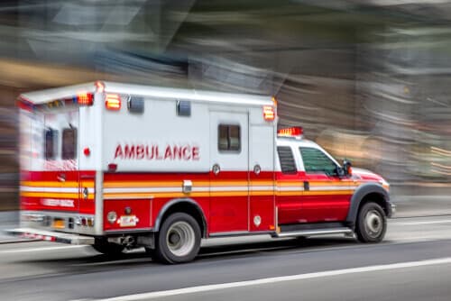 ambulance driving toward an emergency